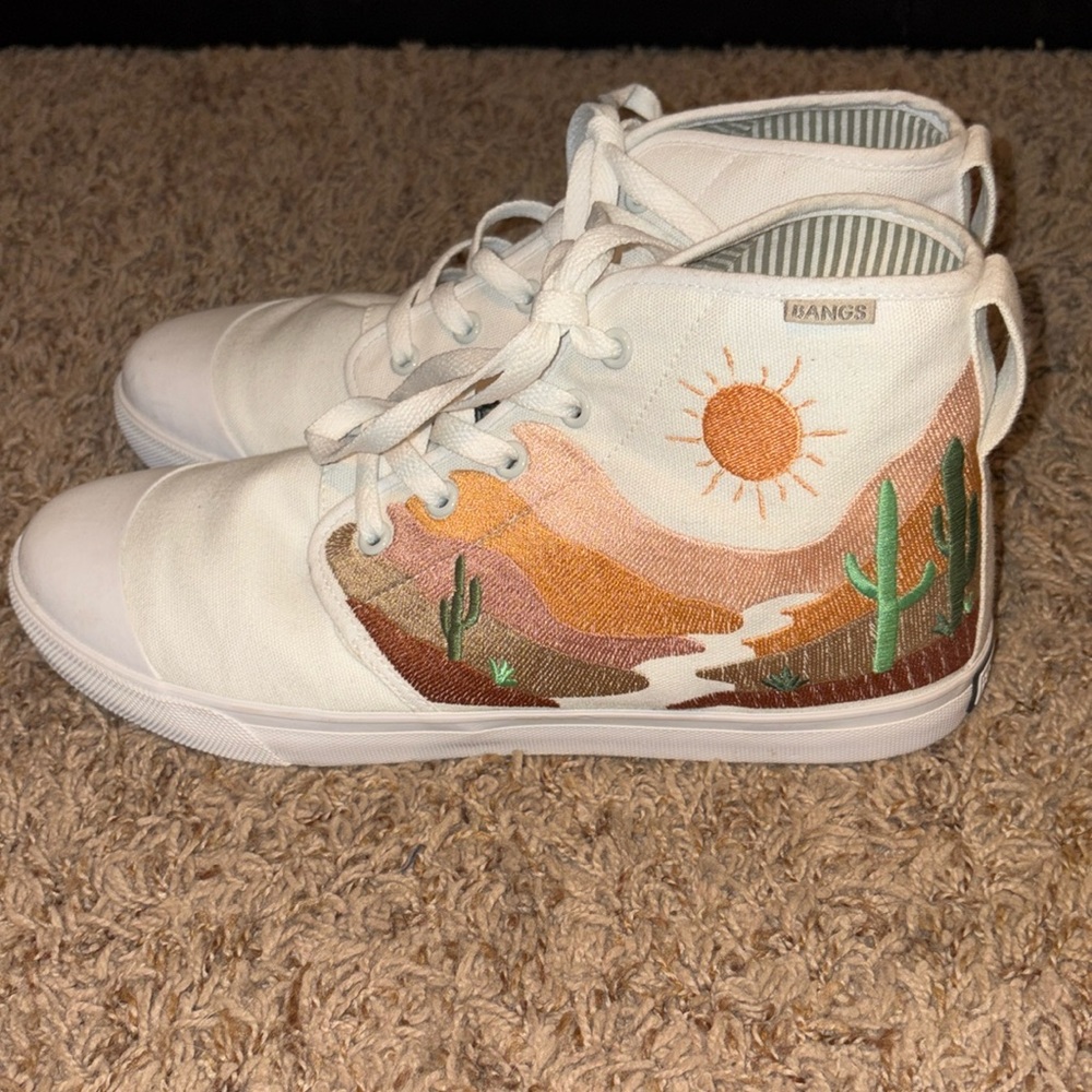 Bangs high tops. Women’s size 10.5. Worn once so pretty much new.